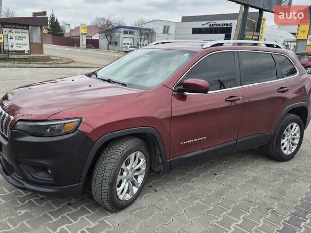 Красный Джип Чероки, объемом двигателя 3.2 л и пробегом 115 тыс. км за 13000 $, фото 1 на Automoto.ua