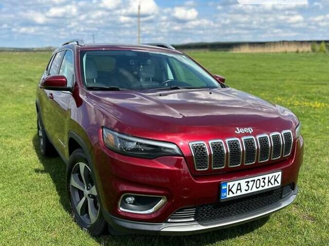 Червоний Джип Cherokee, об'ємом двигуна 3.24 л та пробігом 65 тис. км за 24500 $, фото 1 на Automoto.ua