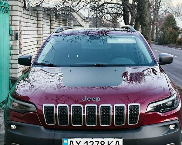 Красный Джип Чероки, объемом двигателя 2 л и пробегом 88 тыс. км за 18500 $, фото 1 на Automoto.ua