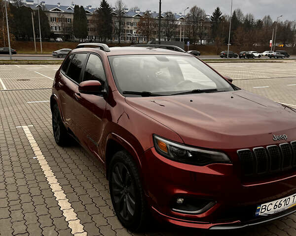 Красный Джип Чероки, объемом двигателя 2 л и пробегом 109 тыс. км за 19500 $, фото 1 на Automoto.ua