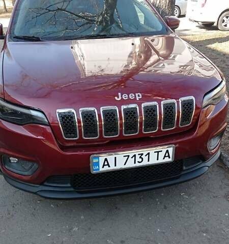 Красный Джип Чероки, объемом двигателя 2.36 л и пробегом 121 тыс. км за 15500 $, фото 1 на Automoto.ua