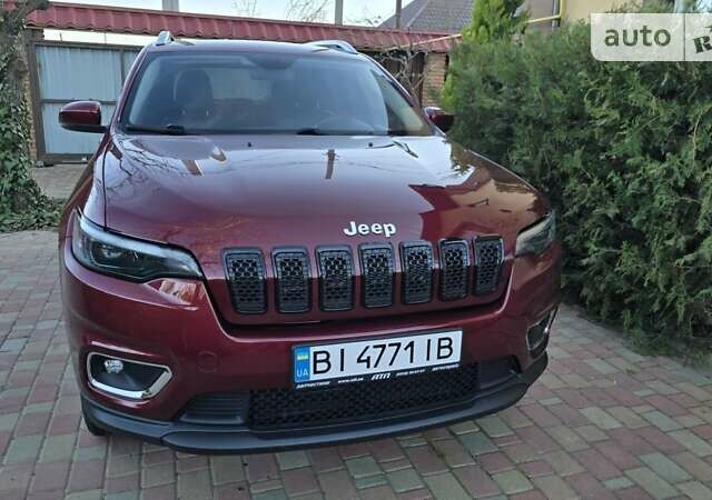 Червоний Джип Cherokee, об'ємом двигуна 3.24 л та пробігом 70 тис. км за 21900 $, фото 1 на Automoto.ua