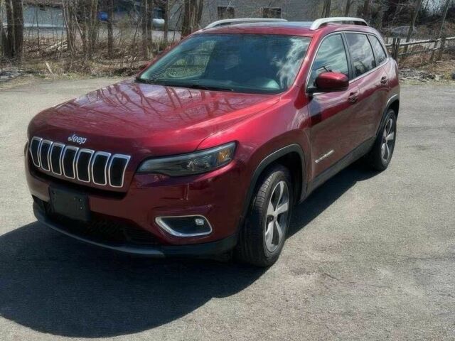 Красный Джип Чероки, объемом двигателя 3.2 л и пробегом 47 тыс. км за 17000 $, фото 1 на Automoto.ua