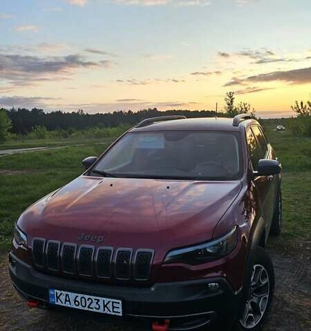 Красный Джип Чероки, объемом двигателя 3.24 л и пробегом 87 тыс. км за 19999 $, фото 1 на Automoto.ua