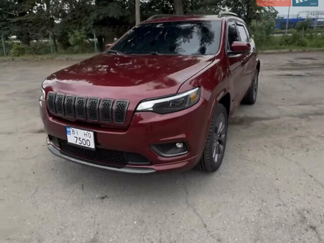 Красный Джип Чероки, объемом двигателя 2 л и пробегом 58 тыс. км за 17800 $, фото 1 на Automoto.ua