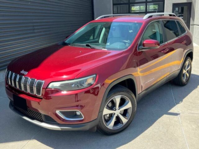 Червоний Джип Cherokee, об'ємом двигуна 3.2 л та пробігом 66 тис. км за 16400 $, фото 1 на Automoto.ua