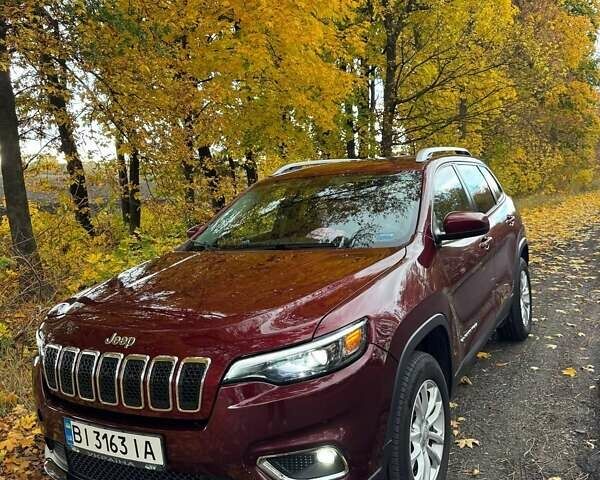 Червоний Джип Cherokee, об'ємом двигуна 2.4 л та пробігом 83 тис. км за 16000 $, фото 1 на Automoto.ua
