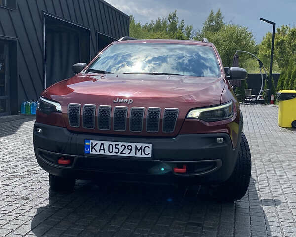 Червоний Джип Cherokee, об'ємом двигуна 2 л та пробігом 60 тис. км за 19500 $, фото 1 на Automoto.ua