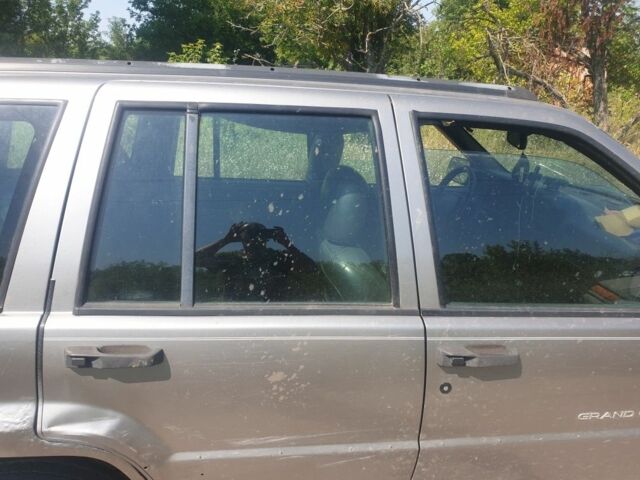 Сірий Джип Cherokee, об'ємом двигуна 2 л та пробігом 309 тис. км за 2012 $, фото 1 на Automoto.ua