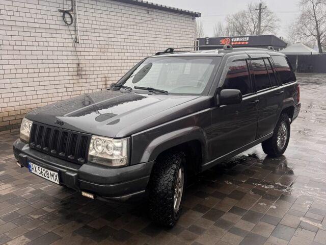 Серый Джип Чероки, объемом двигателя 4 л и пробегом 350 тыс. км за 3700 $, фото 1 на Automoto.ua