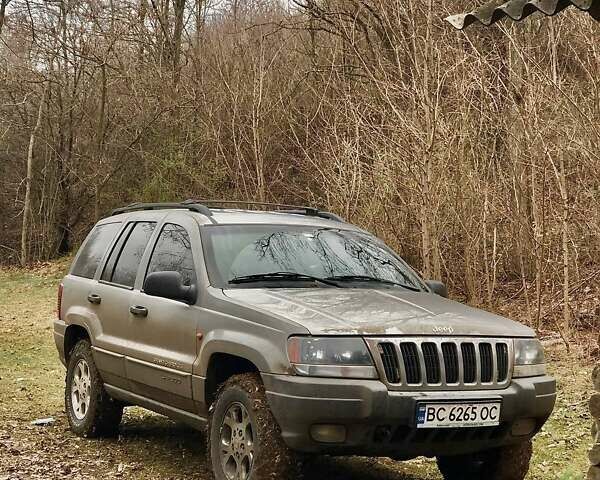 Сірий Джип Cherokee, об'ємом двигуна 3.12 л та пробігом 177 тис. км за 7300 $, фото 1 на Automoto.ua