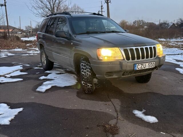 Серый Джип Чероки, объемом двигателя 4 л и пробегом 150 тыс. км за 3500 $, фото 1 на Automoto.ua