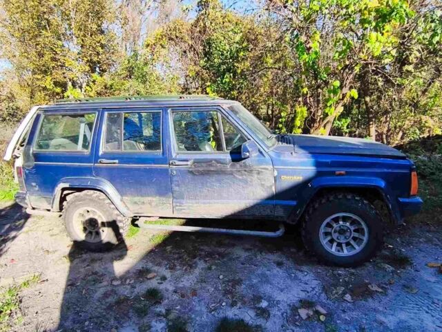 Синий Джип Чероки, объемом двигателя 4 л и пробегом 200 тыс. км за 2700 $, фото 1 на Automoto.ua