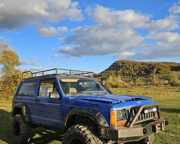 Синий Джип Чероки, объемом двигателя 2.5 л и пробегом 100 тыс. км за 6999 $, фото 1 на Automoto.ua