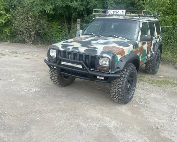 Синий Джип Чероки, объемом двигателя 2.5 л и пробегом 235 тыс. км за 12600 $, фото 1 на Automoto.ua