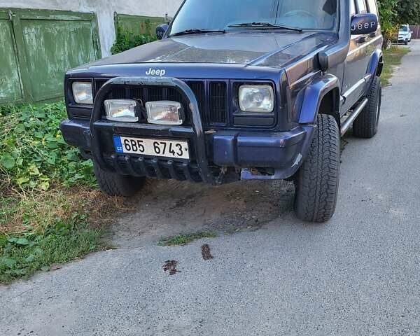 Синий Джип Чероки, объемом двигателя 2.5 л и пробегом 235 тыс. км за 2900 $, фото 1 на Automoto.ua