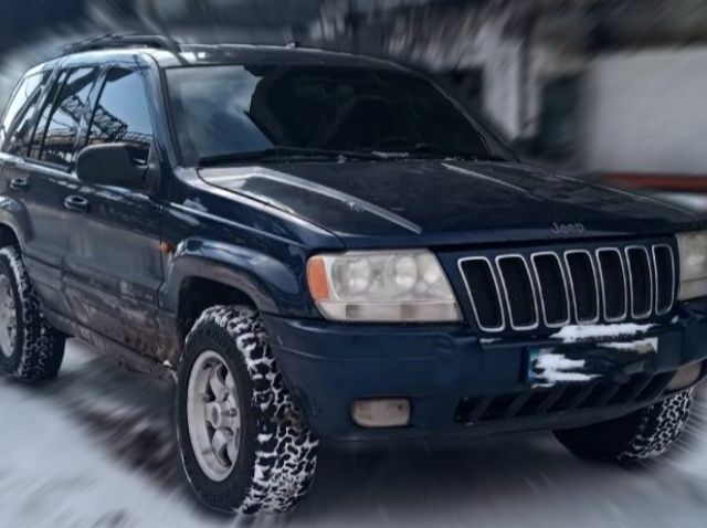 Синий Джип Чероки, объемом двигателя 3.1 л и пробегом 320 тыс. км за 4477 $, фото 1 на Automoto.ua