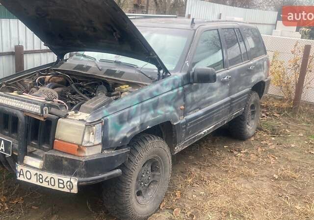Зеленый Джип Чероки, объемом двигателя 4.05 л и пробегом 300 тыс. км за 2800 $, фото 1 на Automoto.ua