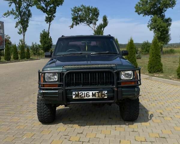 Зеленый Джип Чероки, объемом двигателя 4 л и пробегом 123 тыс. км за 4300 $, фото 1 на Automoto.ua