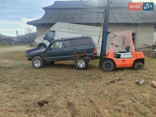 Зелений Джип Cherokee, об'ємом двигуна 2.4 л та пробігом 290 тис. км за 1300 $, фото 1 на Automoto.ua