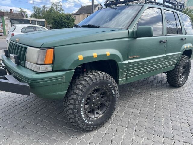 Зеленый Джип Чероки, объемом двигателя 5.2 л и пробегом 360 тыс. км за 5700 $, фото 1 на Automoto.ua