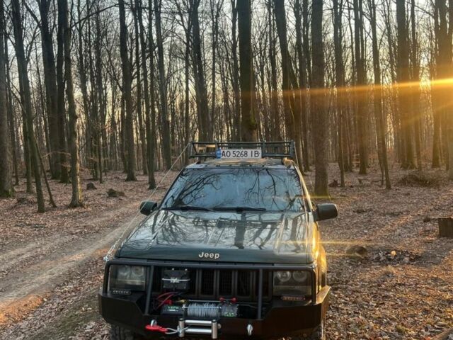 Зелений Джип Cherokee, об'ємом двигуна 5.2 л та пробігом 326 тис. км за 6000 $, фото 1 на Automoto.ua