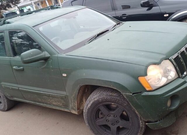 Зеленый Джип Чероки, объемом двигателя 3 л и пробегом 200 тыс. км за 2800 $, фото 1 на Automoto.ua