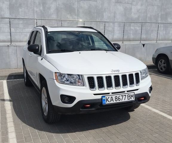 Білий Джип Compass, об'ємом двигуна 2.4 л та пробігом 204 тис. км за 5700 $, фото 1 на Automoto.ua