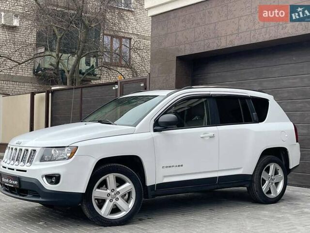 Белый Джип Компас, объемом двигателя 2 л и пробегом 69 тыс. км за 10999 $, фото 1 на Automoto.ua