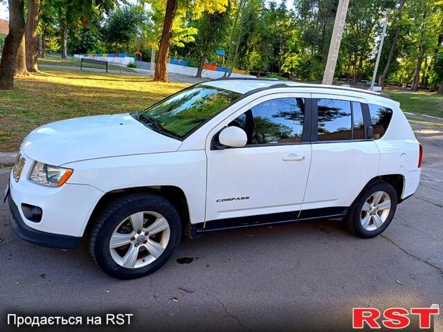 Білий Джип Compass, об'ємом двигуна 2.4 л та пробігом 208 тис. км за 9900 $, фото 1 на Automoto.ua