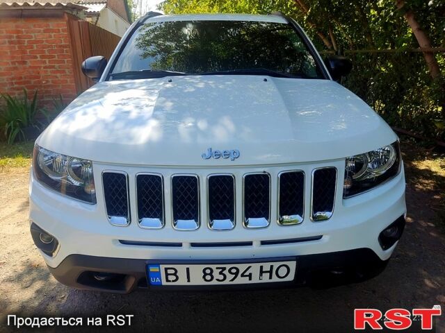 Білий Джип Compass, об'ємом двигуна 2.4 л та пробігом 93 тис. км за 11800 $, фото 1 на Automoto.ua