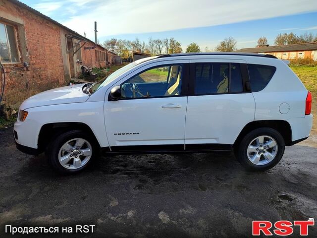 Білий Джип Compass, об'ємом двигуна 2.4 л та пробігом 79 тис. км за 11500 $, фото 1 на Automoto.ua
