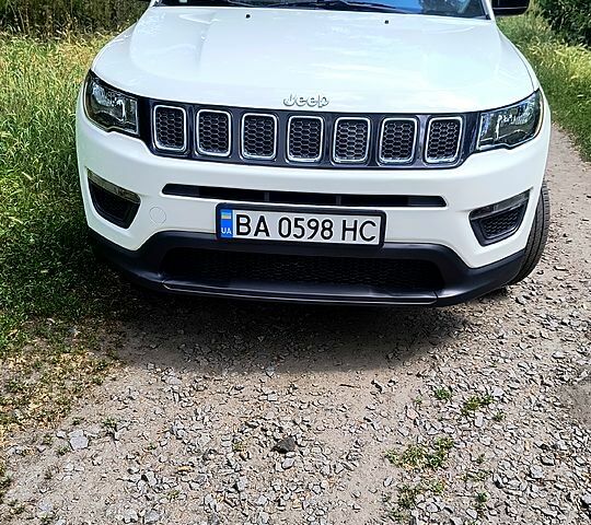Белый Джип Компас, объемом двигателя 2.4 л и пробегом 129 тыс. км за 13300 $, фото 1 на Automoto.ua