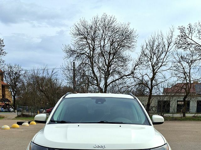 Білий Джип Compass, об'ємом двигуна 2.4 л та пробігом 56 тис. км за 17800 $, фото 1 на Automoto.ua