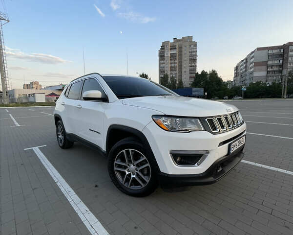 Белый Джип Компас, объемом двигателя 2.4 л и пробегом 58 тыс. км за 17500 $, фото 1 на Automoto.ua