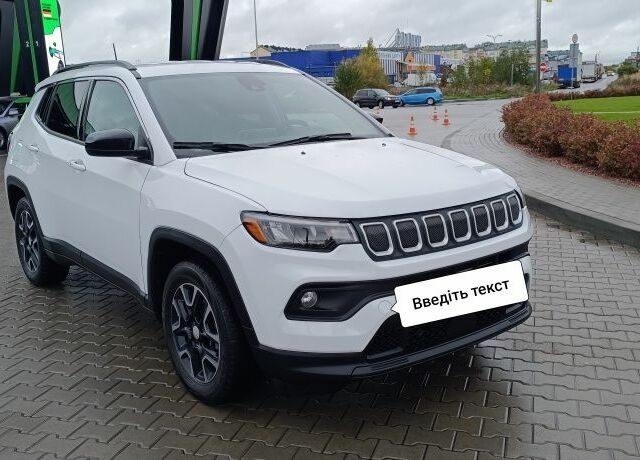 Білий Джип Compass, об'ємом двигуна 2.4 л та пробігом 97 тис. км за 17500 $, фото 1 на Automoto.ua