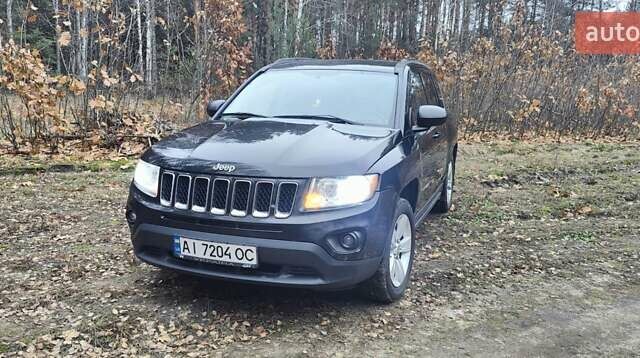 Черный Джип Компас, объемом двигателя 2.36 л и пробегом 198 тыс. км за 8700 $, фото 1 на Automoto.ua