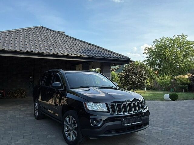 Чорний Джип Compass, об'ємом двигуна 2 л та пробігом 118 тис. км за 10499 $, фото 1 на Automoto.ua