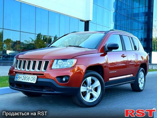 Червоний Джип Compass, об'ємом двигуна 2.4 л та пробігом 130 тис. км за 8999 $, фото 1 на Automoto.ua