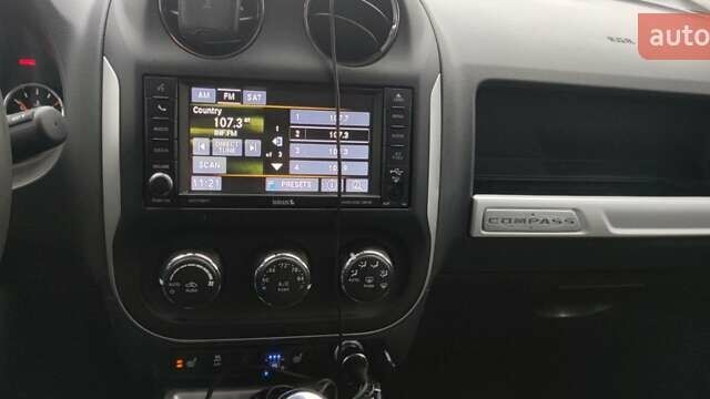 Червоний Джип Compass, об'ємом двигуна 2.4 л та пробігом 98 тис. км за 9500 $, фото 1 на Automoto.ua