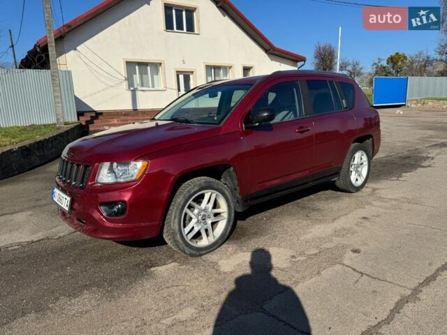 Красный Джип Компас, объемом двигателя 2 л и пробегом 244 тыс. км за 9500 $, фото 1 на Automoto.ua