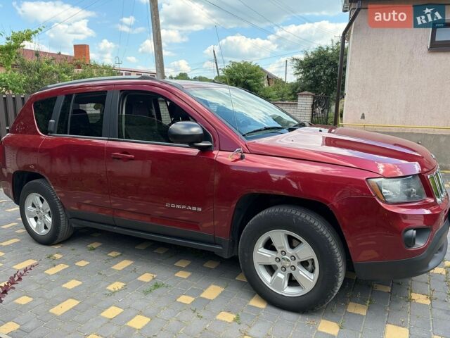 Червоний Джип Compass, об'ємом двигуна 2 л та пробігом 216 тис. км за 10500 $, фото 1 на Automoto.ua