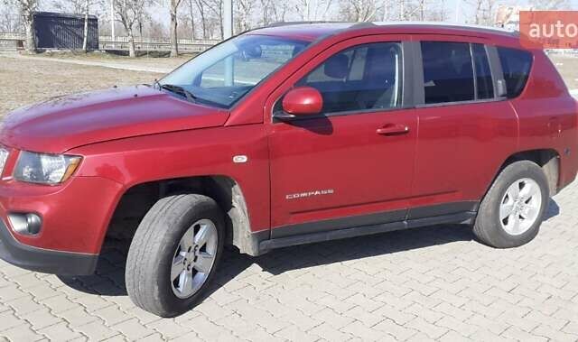 Червоний Джип Compass, об'ємом двигуна 2 л та пробігом 170 тис. км за 10200 $, фото 1 на Automoto.ua
