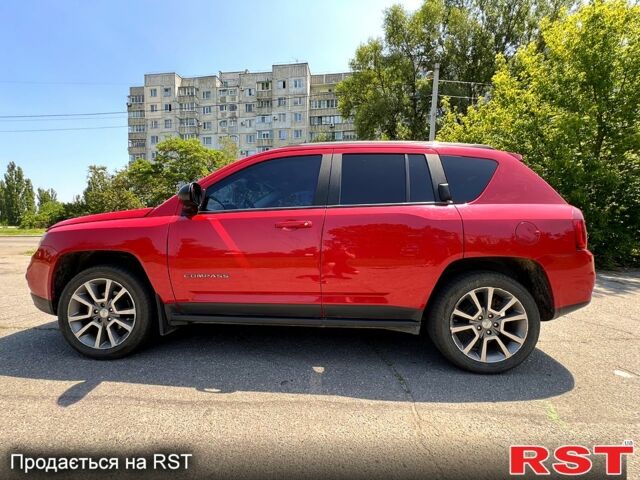 Червоний Джип Compass, об'ємом двигуна 2 л та пробігом 126 тис. км за 9700 $, фото 1 на Automoto.ua
