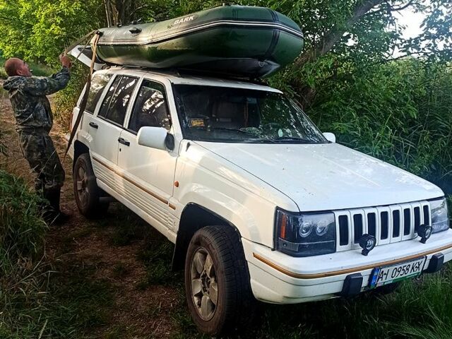 Білий Джип Grand Cherokee, об'ємом двигуна 4 л та пробігом 400 тис. км за 4500 $, фото 1 на Automoto.ua