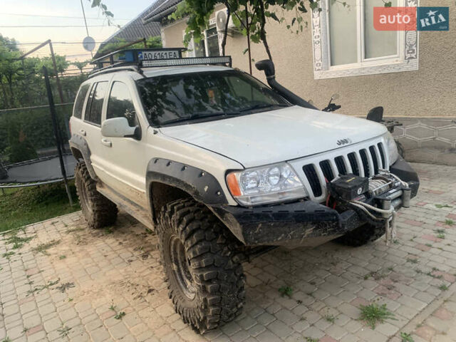 Білий Джип Grand Cherokee, об'ємом двигуна 4.7 л та пробігом 245 тис. км за 13200 $, фото 1 на Automoto.ua