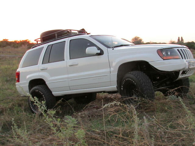 Білий Джип Grand Cherokee, об'ємом двигуна 4.7 л та пробігом 240 тис. км за 6988 $, фото 1 на Automoto.ua