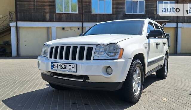 Білий Джип Grand Cherokee, об'ємом двигуна 4.7 л та пробігом 220 тис. км за 11300 $, фото 1 на Automoto.ua