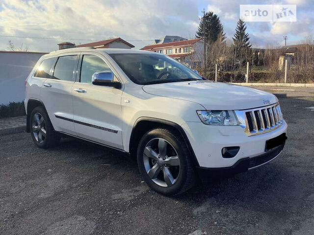 Білий Джип Grand Cherokee, об'ємом двигуна 3 л та пробігом 165 тис. км за 17500 $, фото 1 на Automoto.ua