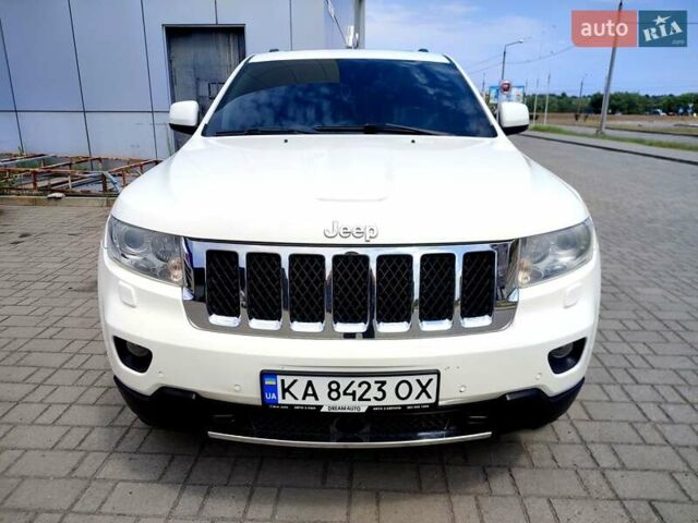 Білий Джип Grand Cherokee, об'ємом двигуна 3 л та пробігом 285 тис. км за 13350 $, фото 1 на Automoto.ua
